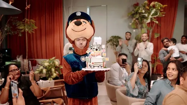 Birthday party with mascot and cake